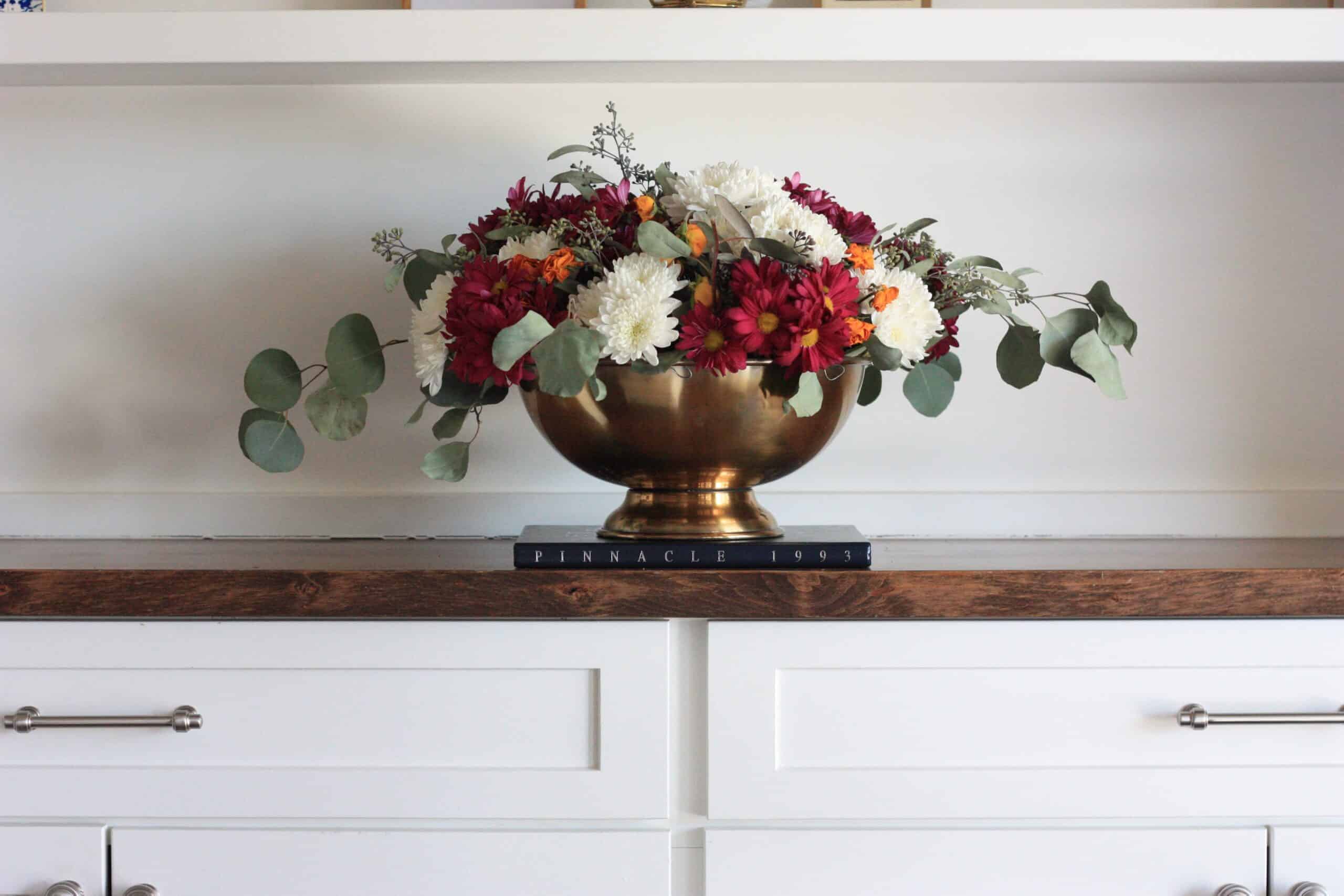 Learn how to make a beginner compote flower arrangement